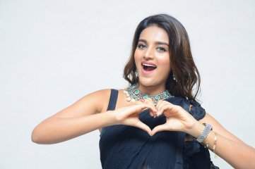 Nidhi Agerwal at Ismart Shankar Pre Release Pressmeet